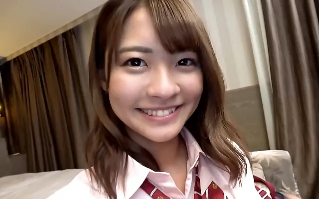 Two cute Japanese teens swap microphones for cock in a sweet bed performance