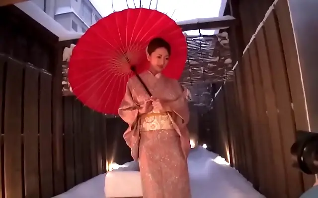 Silk curtain tease with a naughty Japanese beauty and her big tits