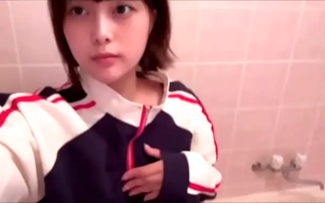 Red-lit karaoke room hides shy college girl's secret pleasure